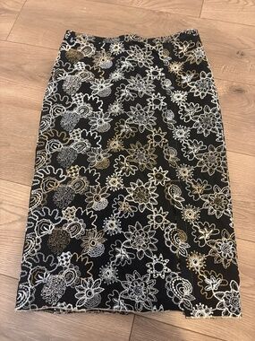 BURNING TORCH black embroidered pencil skirt.